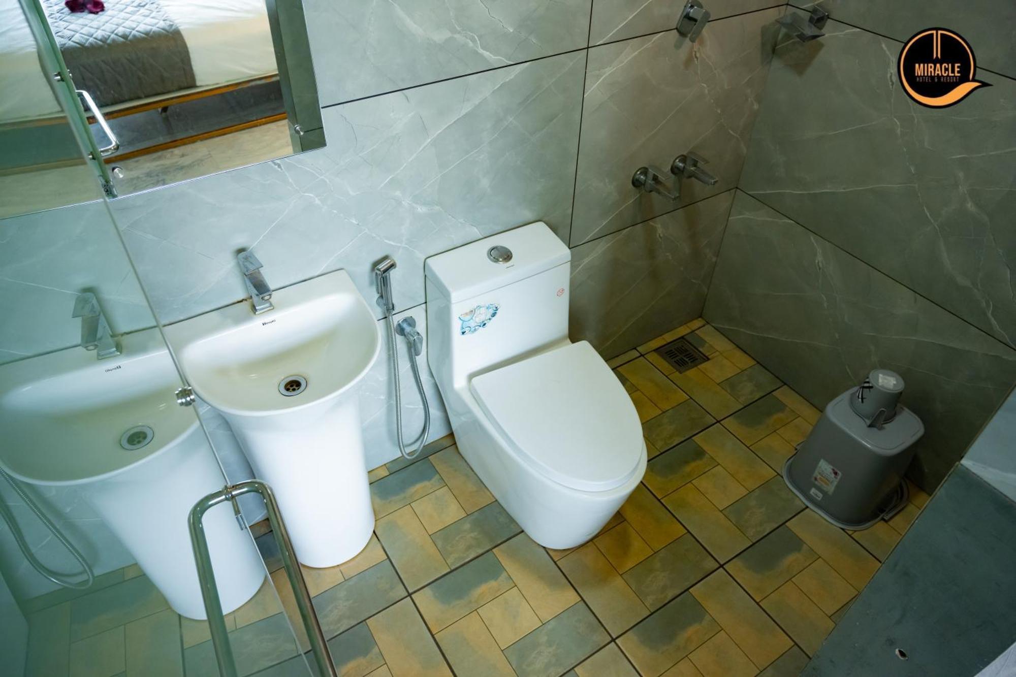 Miracle Hotel And Resorts Calecute Quarto foto